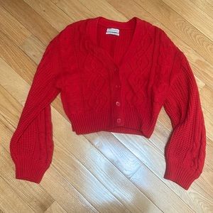 Red urban outfitters cropped knit cardigan.